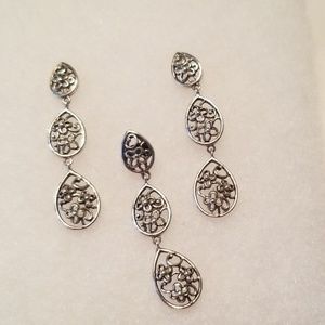 Sterling silver earring and pendant set.